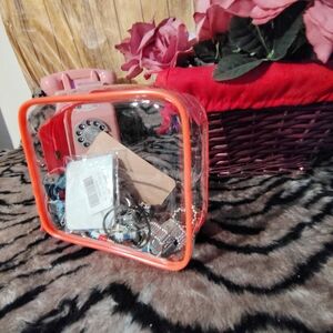 Clear Orange Trim Cosmetic Bag With Random Jewlrey